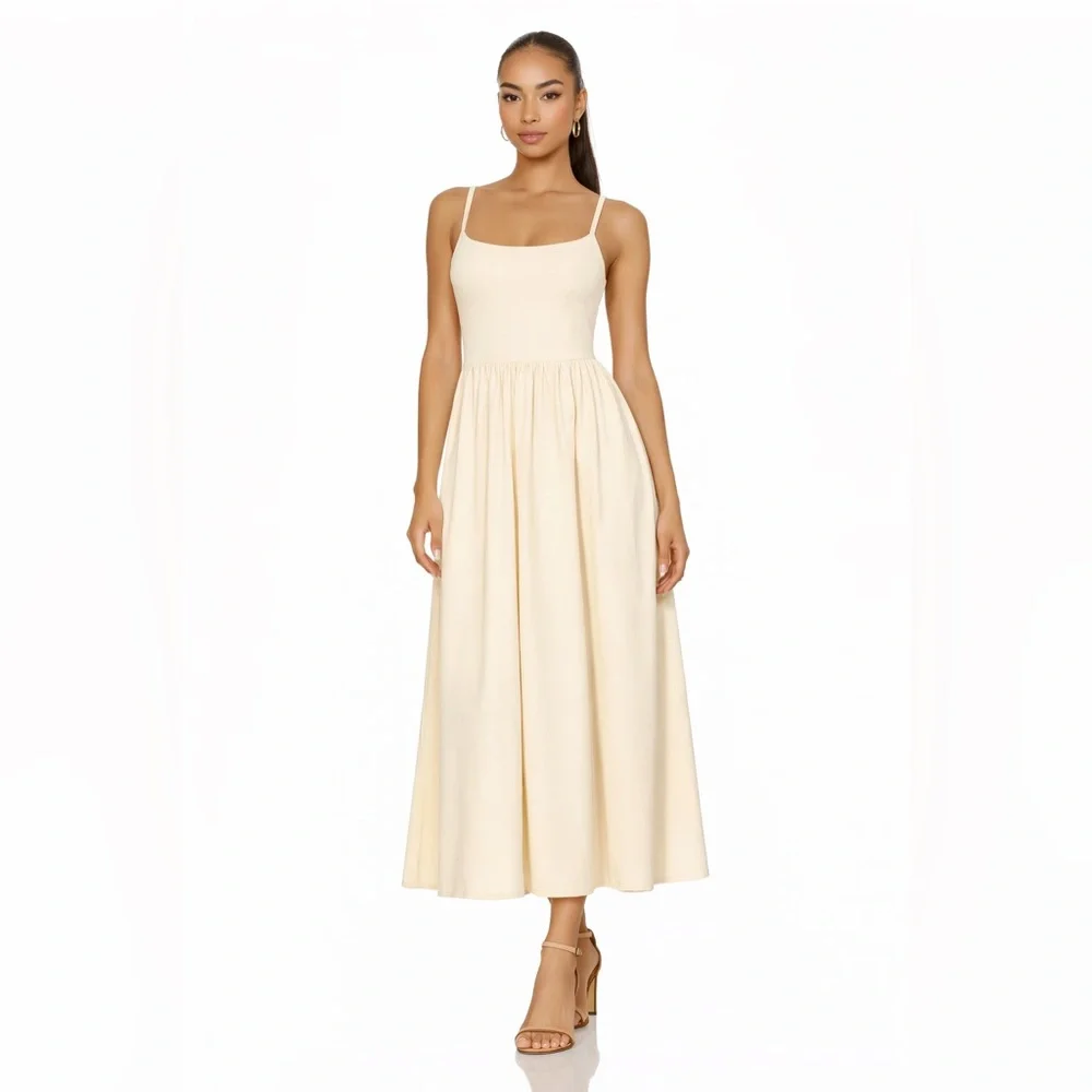 uniqlo cream dress Uniqlo's Viral Built-In Bra Top Now Comes As A Dress